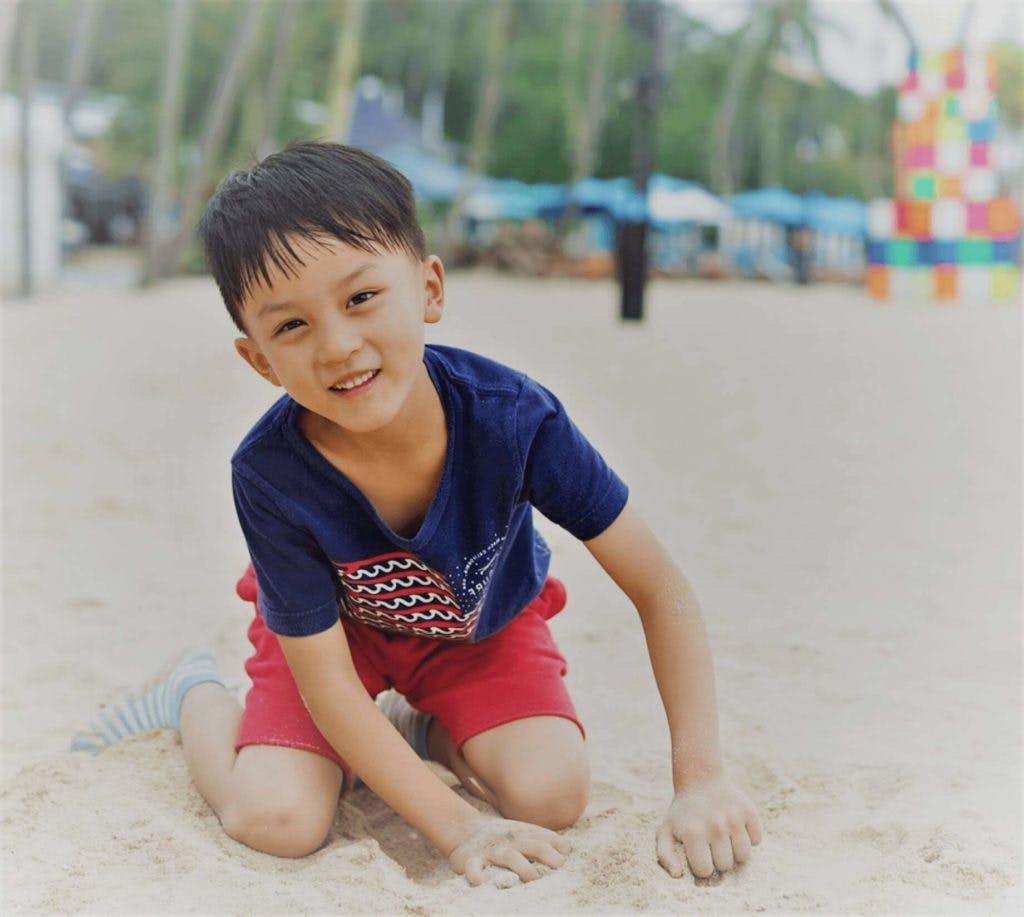Kid on the beach image